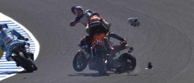 Marc Marquez crashes with Ratthapark Wilairot - Photo Credit: MotoGP.com