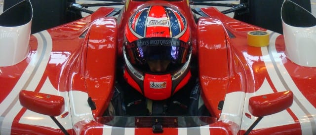 Steele sits in an F2 car during his seat fitting 