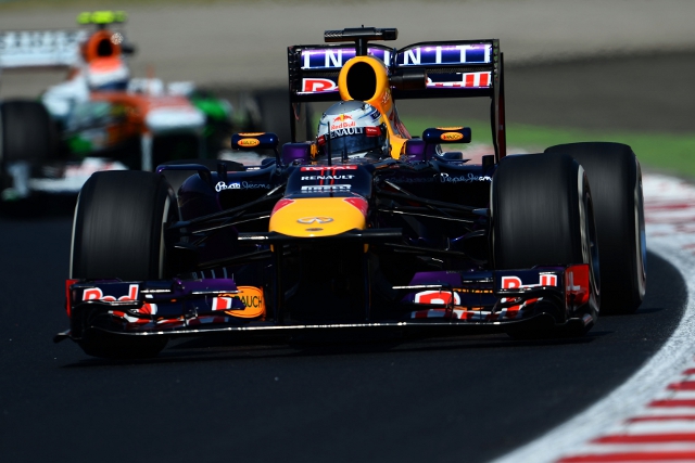 Vettel will start on the front row alongside Hamilton's Mercedes (Credit: Lars Baron/Getty Images)