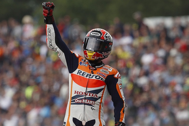 The victory salute of a world champion (Photo Credit: MotoGP.com)