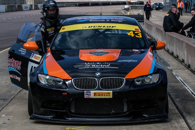 Kevin Clarke pushes his E92 M3 down pit lane after stopping in the wrong pit box.