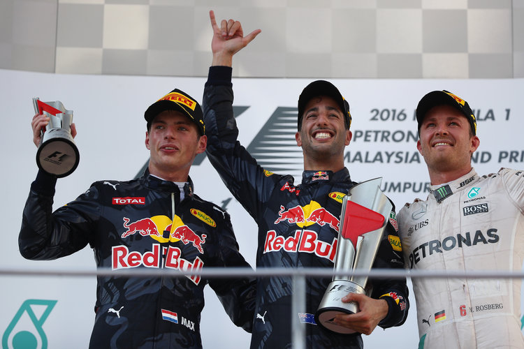 KUALA LUMPUR, MALAYSIA - OCTOBER 02:  Daniel Ricciardo of Australia and Red Bull Racing, Max Verstappen of Netherlands and Red Bull Racing and Nico Rosberg of Germany and Mercedes GP on the podium during the Malaysia Formula One Grand Prix at Sepang Circuit on October 2, 2016 in Kuala Lumpur, Malaysia.  (Photo by Clive Mason/Getty Images). Credit: Red Bull Content Pool