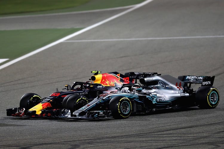 Max Verstappen passing Lewis Hamilton at the 2018 Bahrain Grand Prix