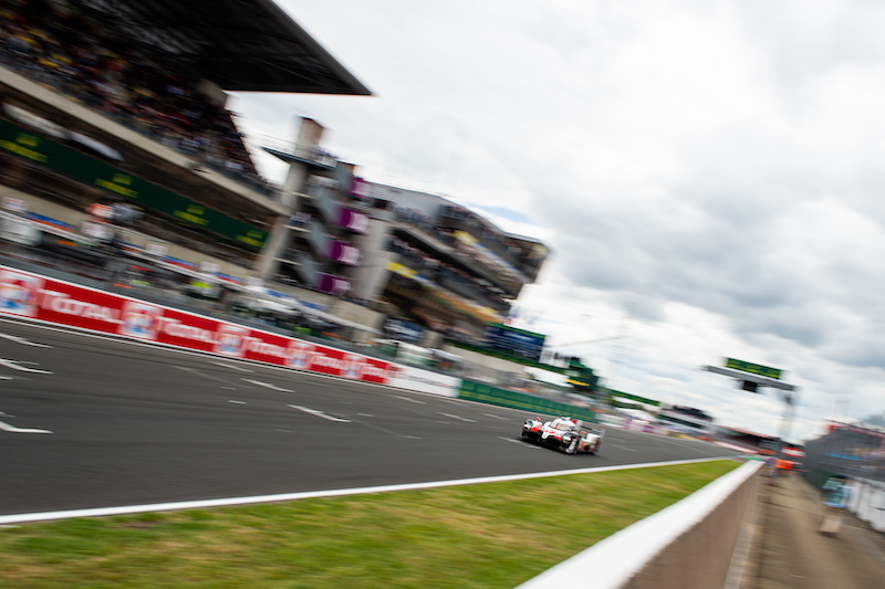 #7 Toyota on track down the main straight at Le Mans, 2019