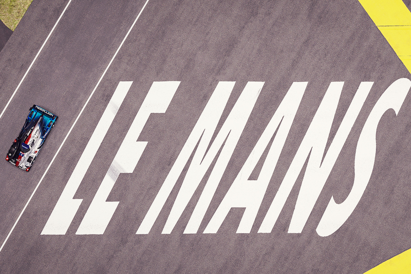 Rebellion Williams Esports on track at Le Mans, next to Le Mans wording