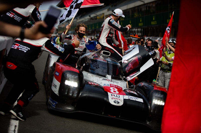 Brendon Hartley, Sebastien Buemi and Kazuki Nakajima celebrating their overall victory at the 2020 24 Hours of Le Mans.
