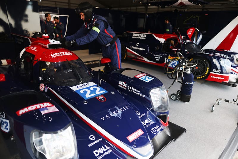 #22 and #23 United Autosports LMP2 cars in garage