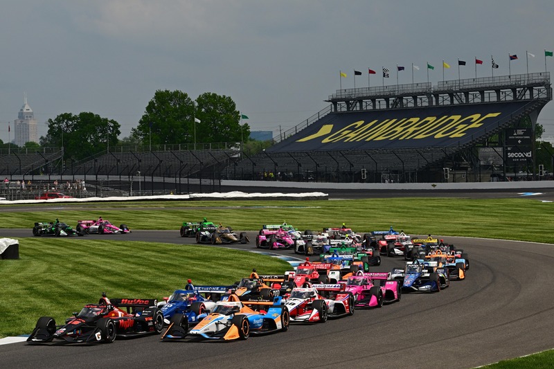 The IndyCar field prepares to start the 2023 GMR Grand Prix at the Indianapolis Motor Speedway.